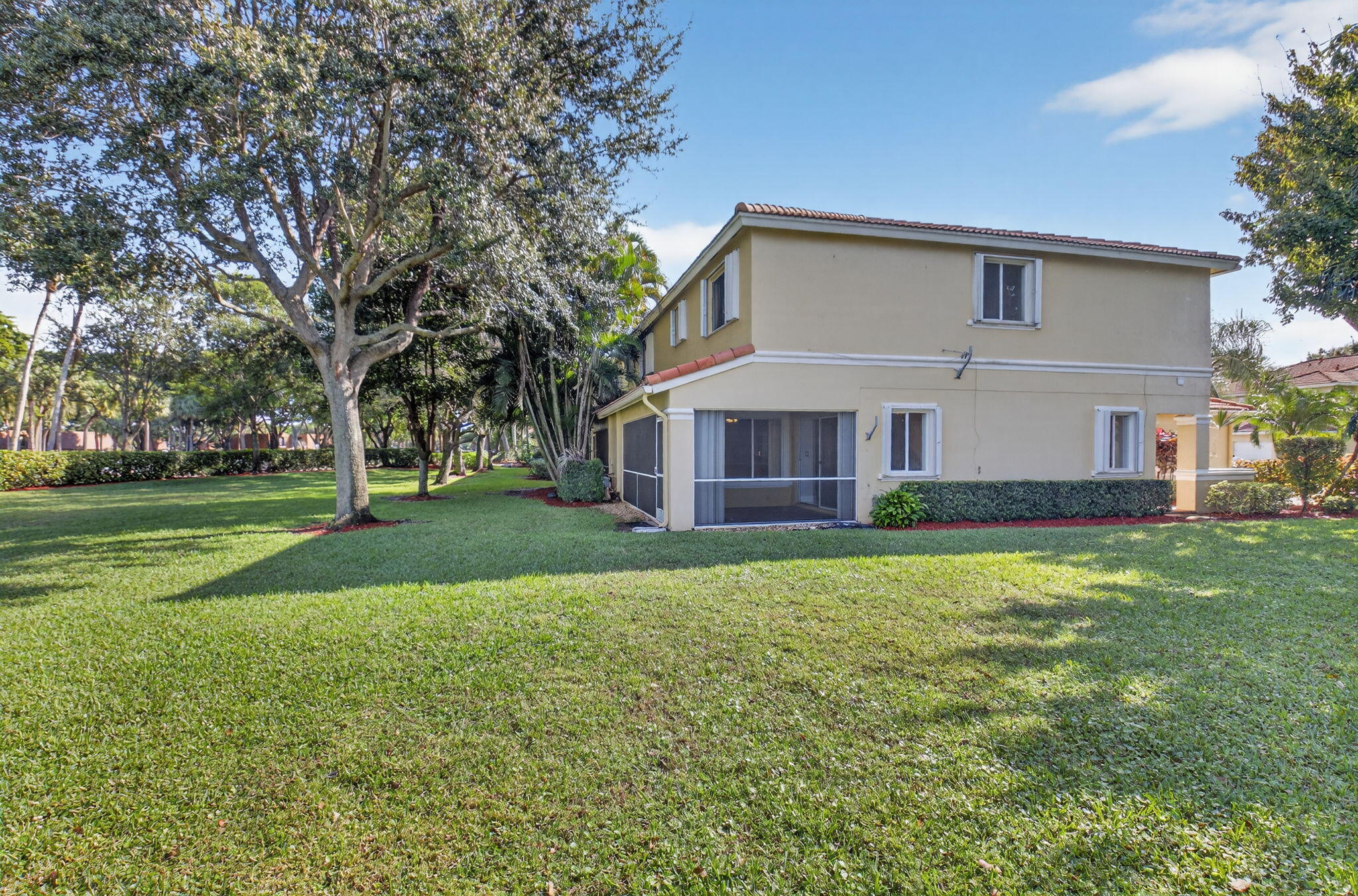 1728 Arezzo Circle Boynton Beach, FL 33436 - Photo 59 of 66 a view of a house with a big yard