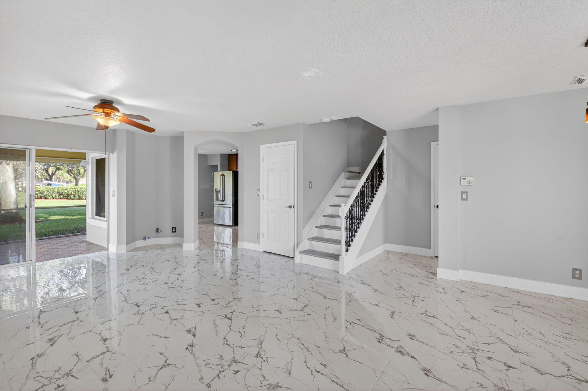 1728 Arezzo Circle Boynton Beach, FL 33436 - Photo 6 of 66 wooden floor in an empty room
