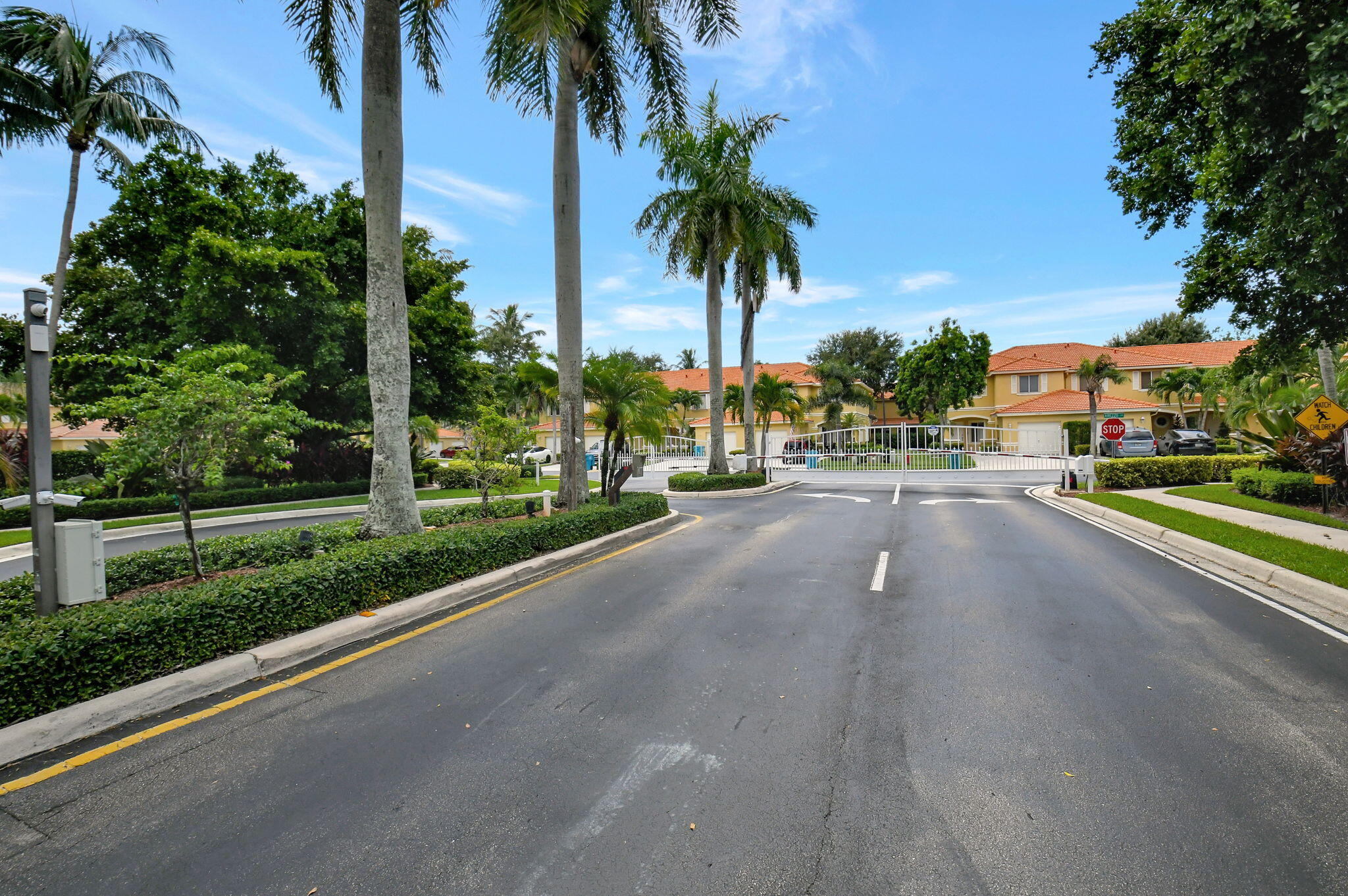1728 Arezzo Circle Boynton Beach, FL 33436 - Photo 63 of 66 a view of a street with a building in the background