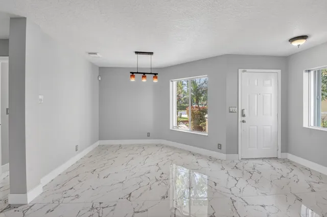 a view of a room with a window