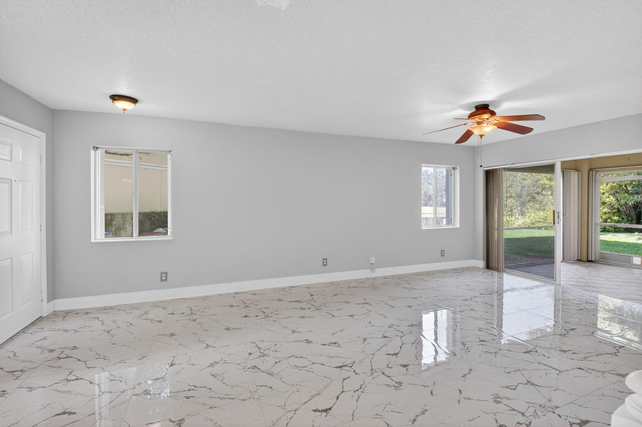 1728 Arezzo Circle Boynton Beach, FL 33436 - Photo 10 of 66 a view of an empty room with a window
