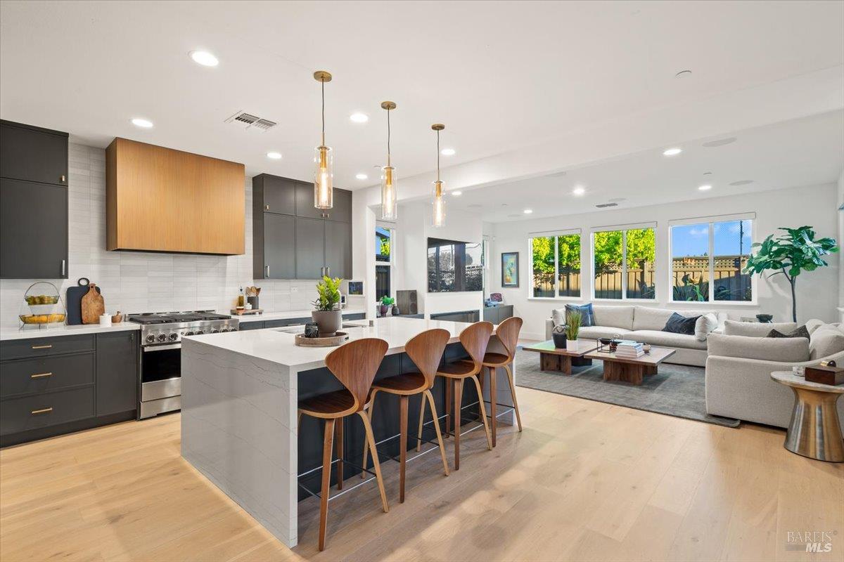 1469 Oak Circle Rohnert Park, CA 94928 - Photo 4 of 42 Connected Living at Its Finest The great room flows seamlessly into the dining area and custom kitchen, creating the ideal environment for entertaining, relaxing, and everyday life.