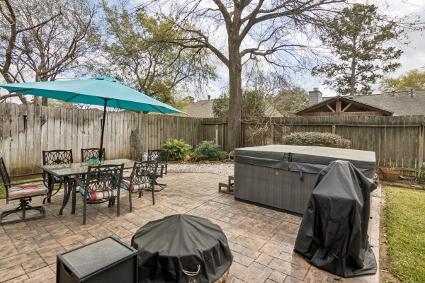 9211 Benwick Street Spring, TX 77379 - Photo 22 of 24 Custom Pattern stamped into the cement in the back patio area.