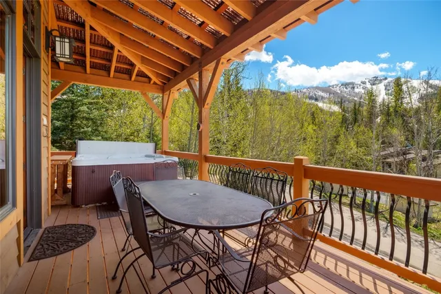a view of a balcony with furniture