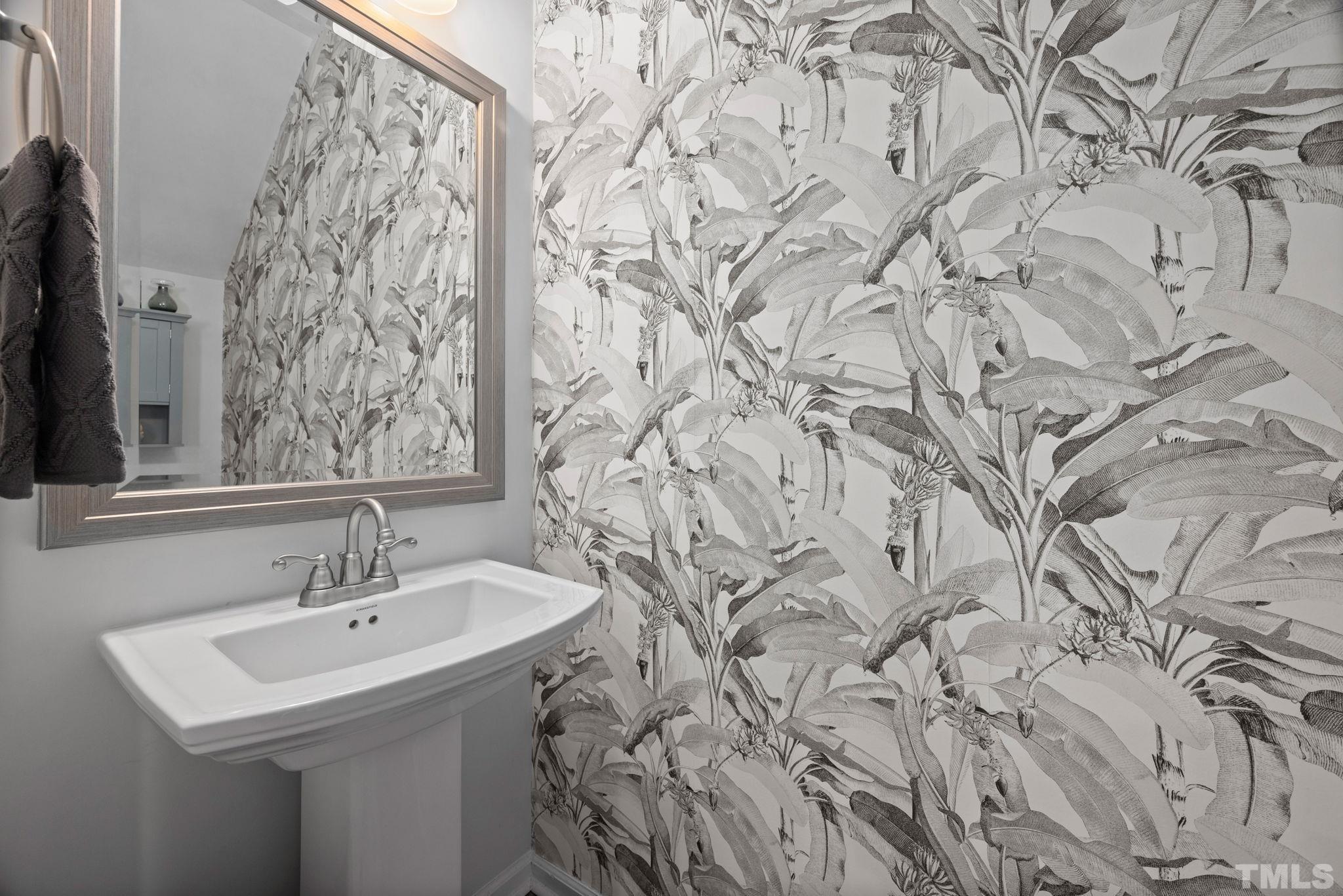 3614 Water Mist Lane Raleigh, NC 27604 - Photo 15 of 50 a bathroom with a sink and vanity