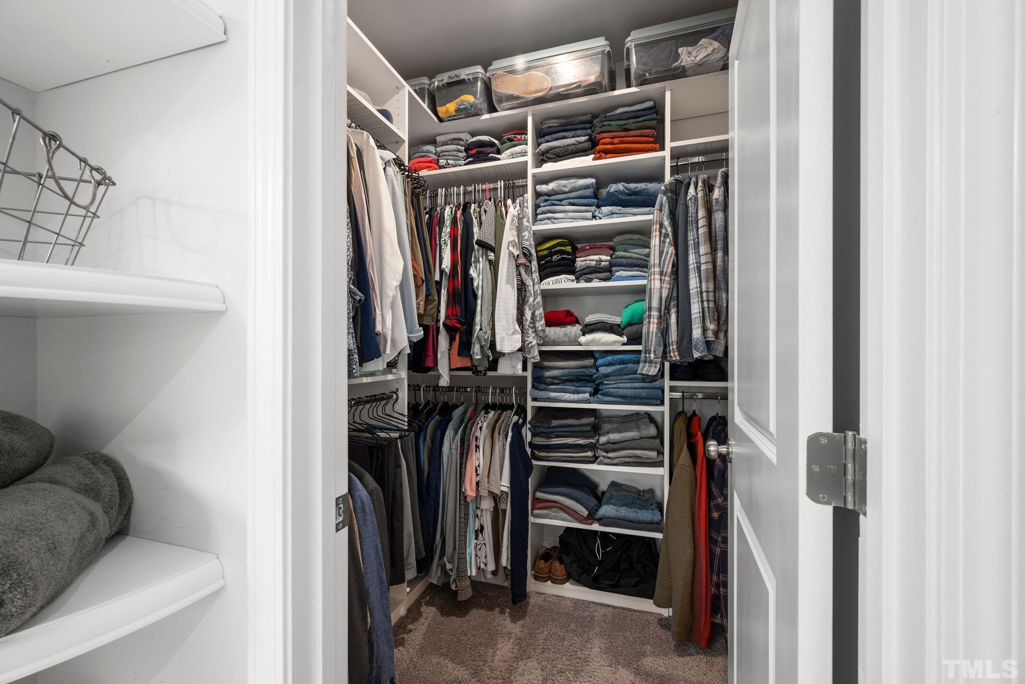 3614 Water Mist Lane Raleigh, NC 27604 - Photo 23 of 50 a view of walk in closet with clothes and shoes
