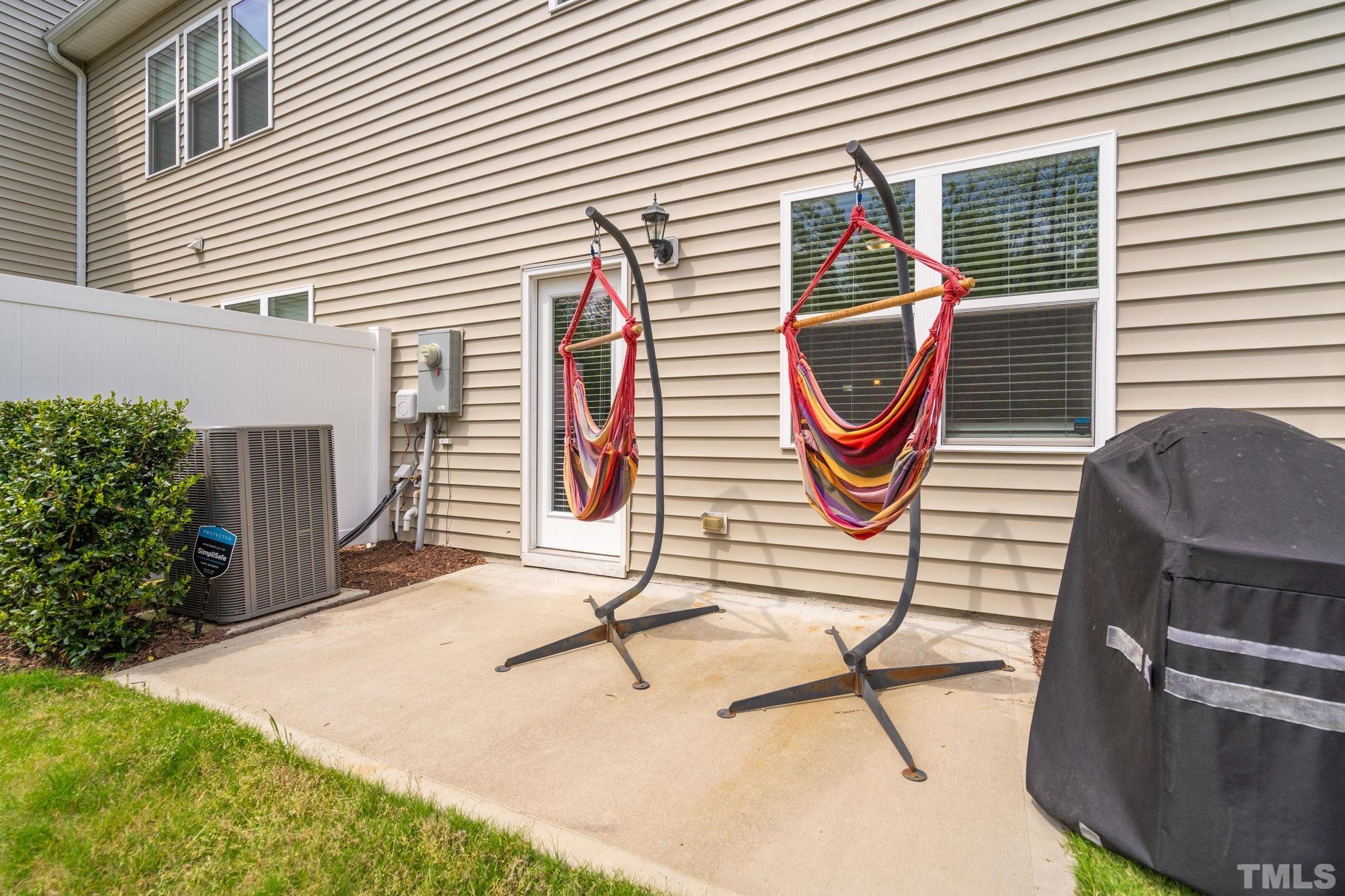 3614 Water Mist Lane Raleigh, NC 27604 - Photo 30 of 50 a backyard of a house with seating space and stairs