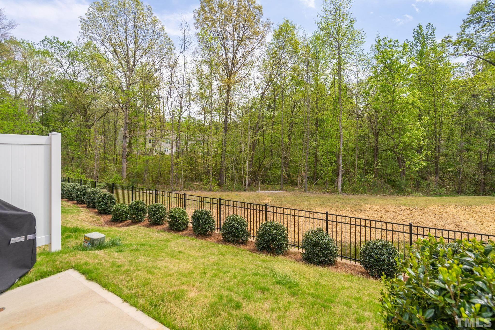 3614 Water Mist Lane Raleigh, NC 27604 - Photo 32 of 50 a view of a pathway with a yard