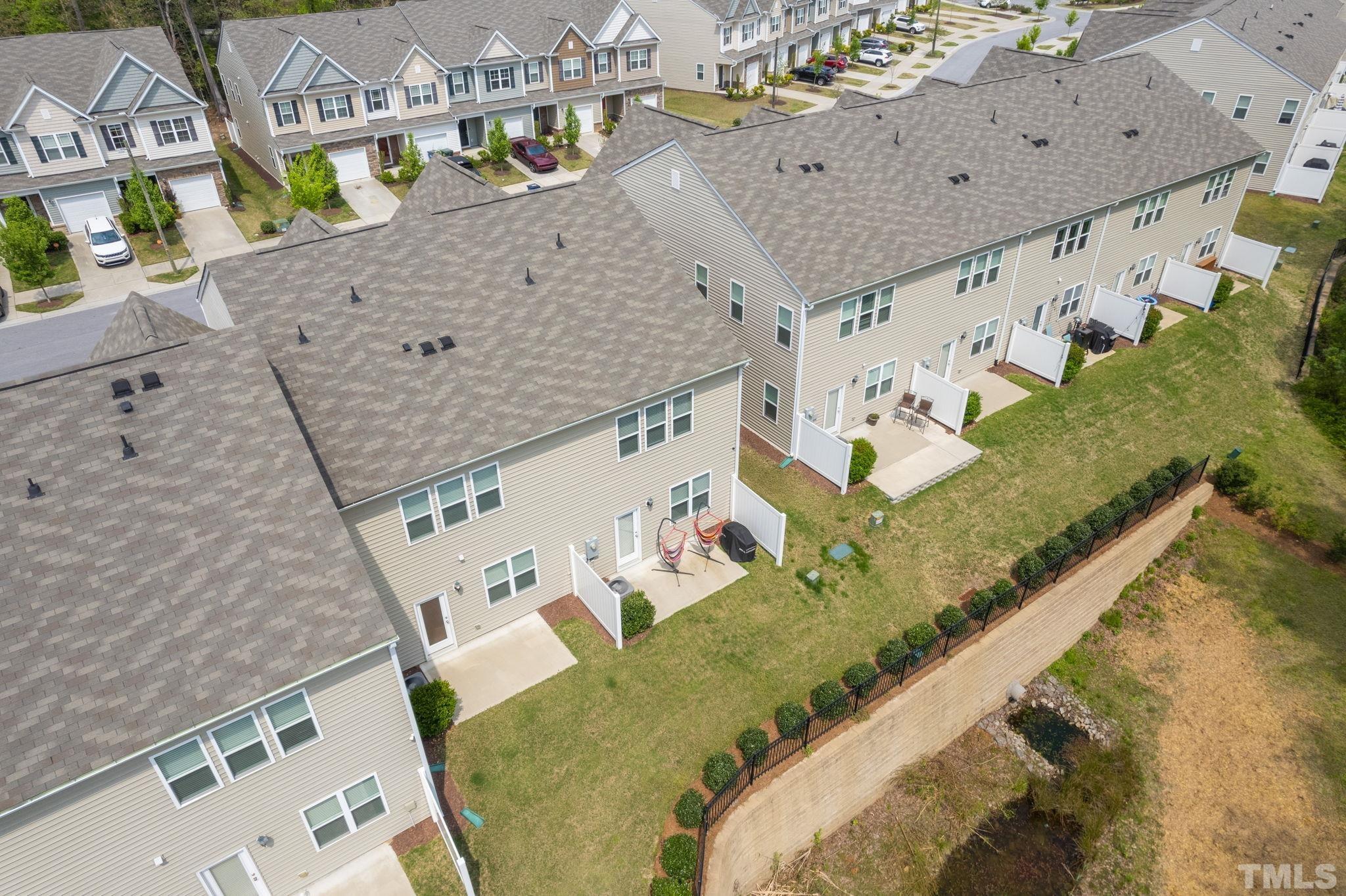 3614 Water Mist Lane Raleigh, NC 27604 - Photo 39 of 50 top view of a large buildings with an outdoor space