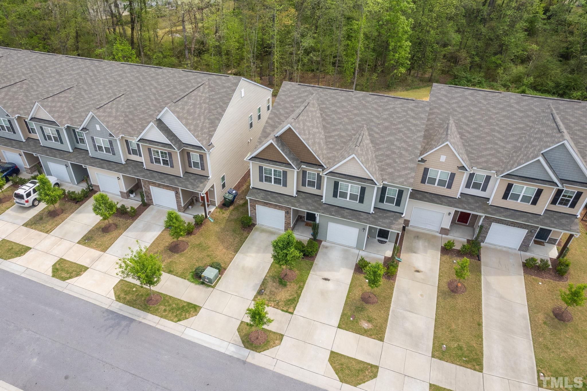 3614 Water Mist Lane Raleigh, NC 27604 - Photo 42 of 50 a aerial view of a house with a garden and balcony
