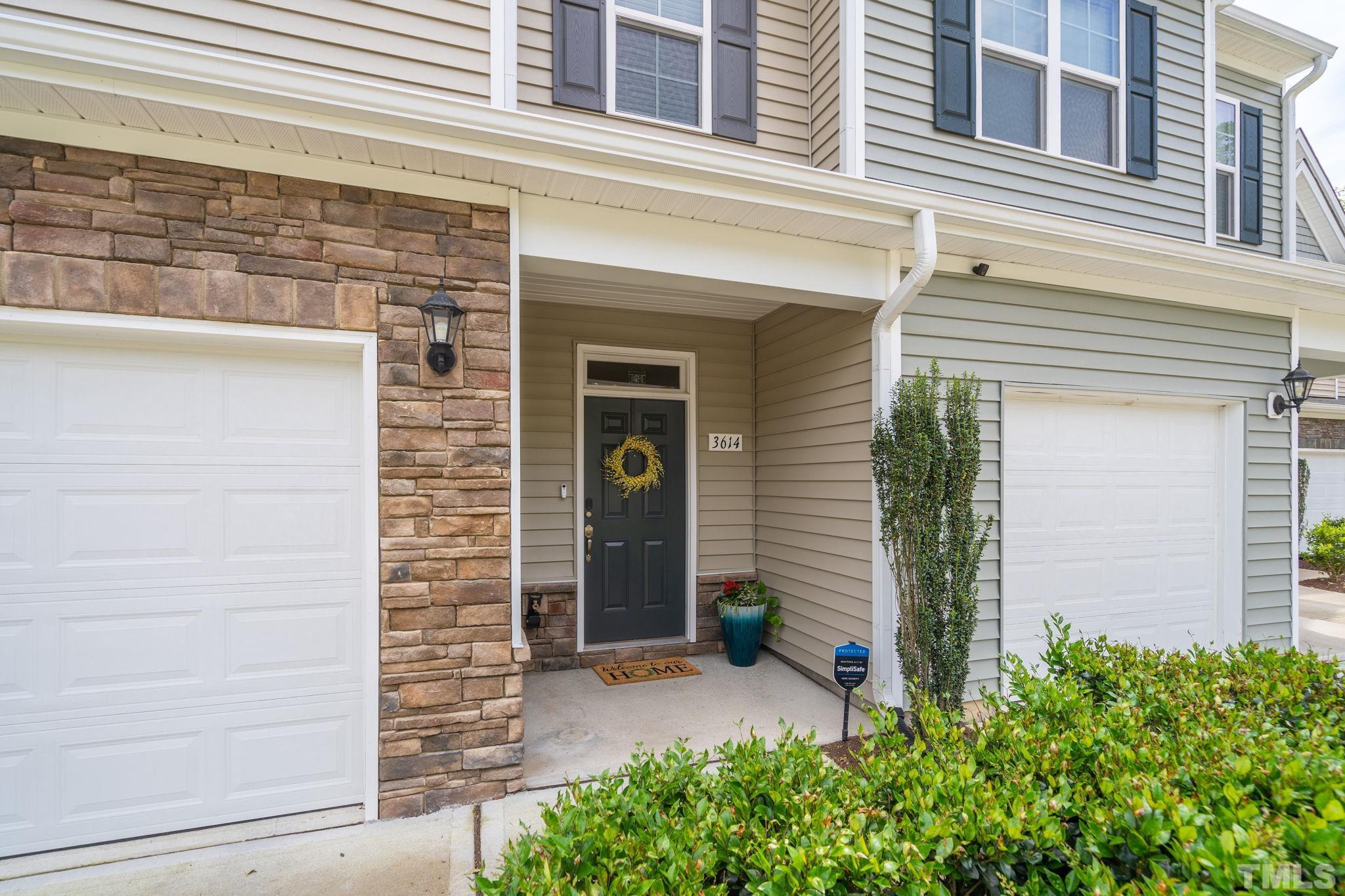 3614 Water Mist Lane Raleigh, NC 27604 - Photo 5 of 50 a front view of a house with a yard