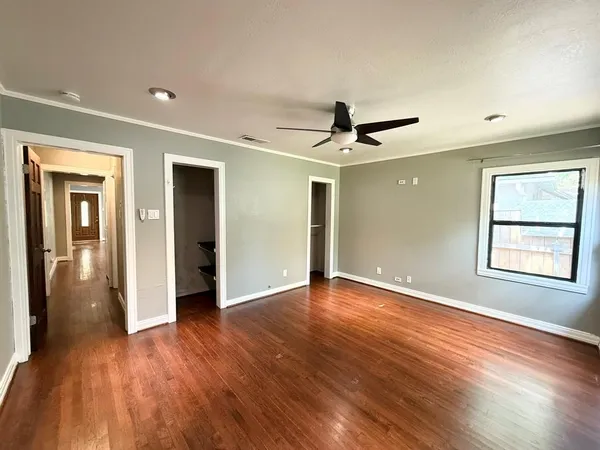 a view of livingroom with hardwood floor and a ceiling fan