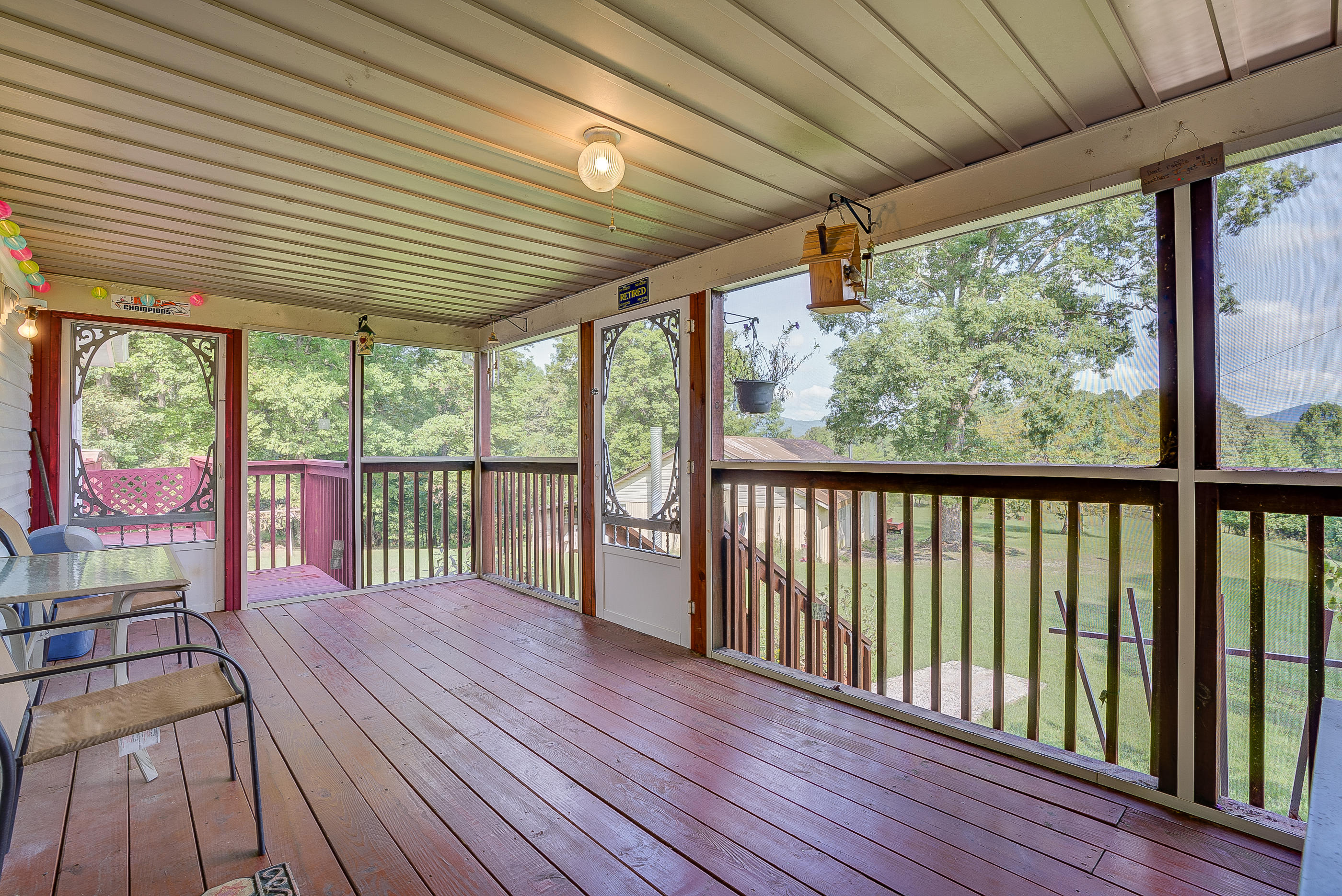 1133 Running Deer Ridge, Unit 1083 Goodview, VA 24095 - Photo 18 of 35 a view of a balcony with wooden floor