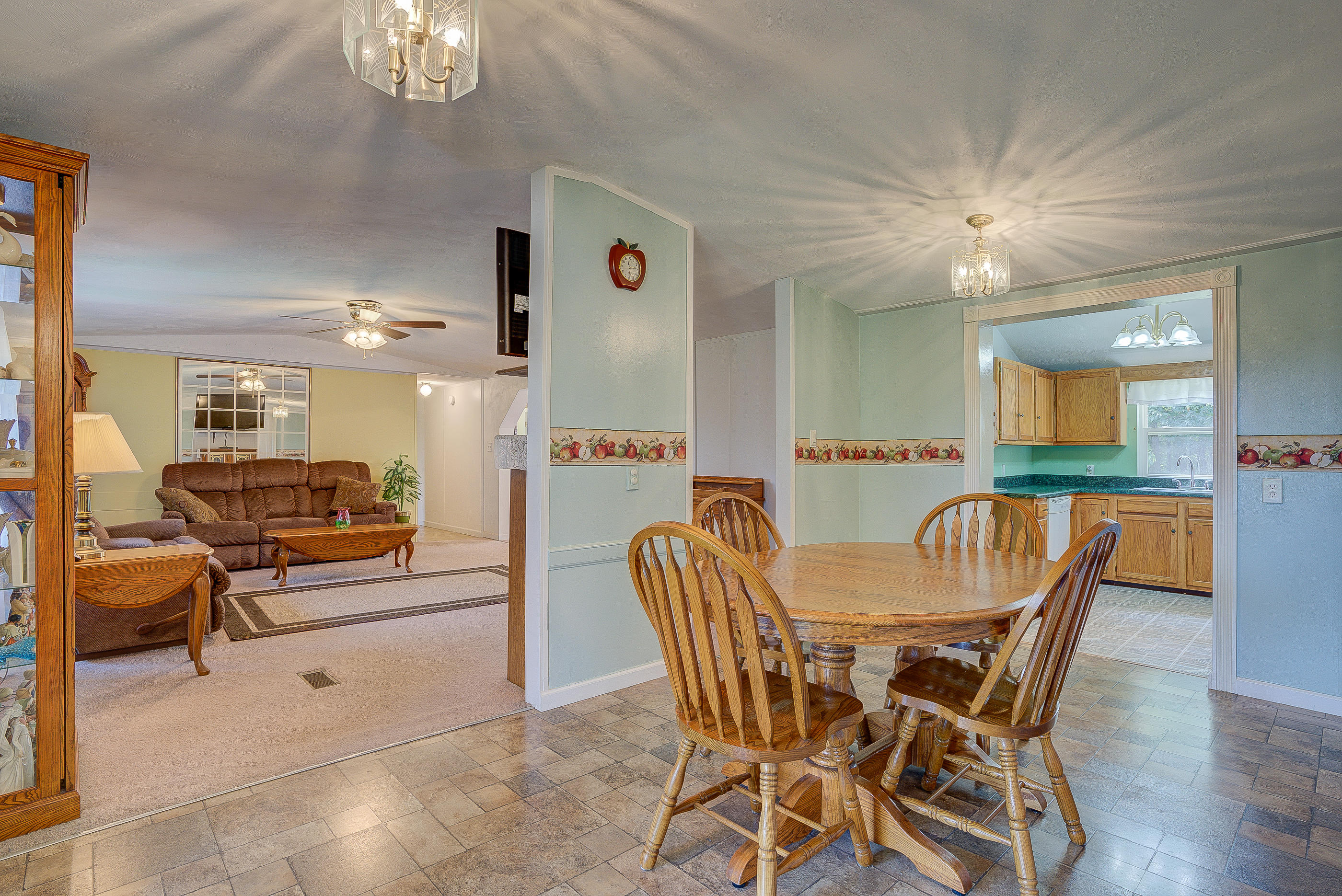 1133 Running Deer Ridge, Unit 1083 Goodview, VA 24095 - Photo 19 of 35 a dining room with furniture and wooden floor