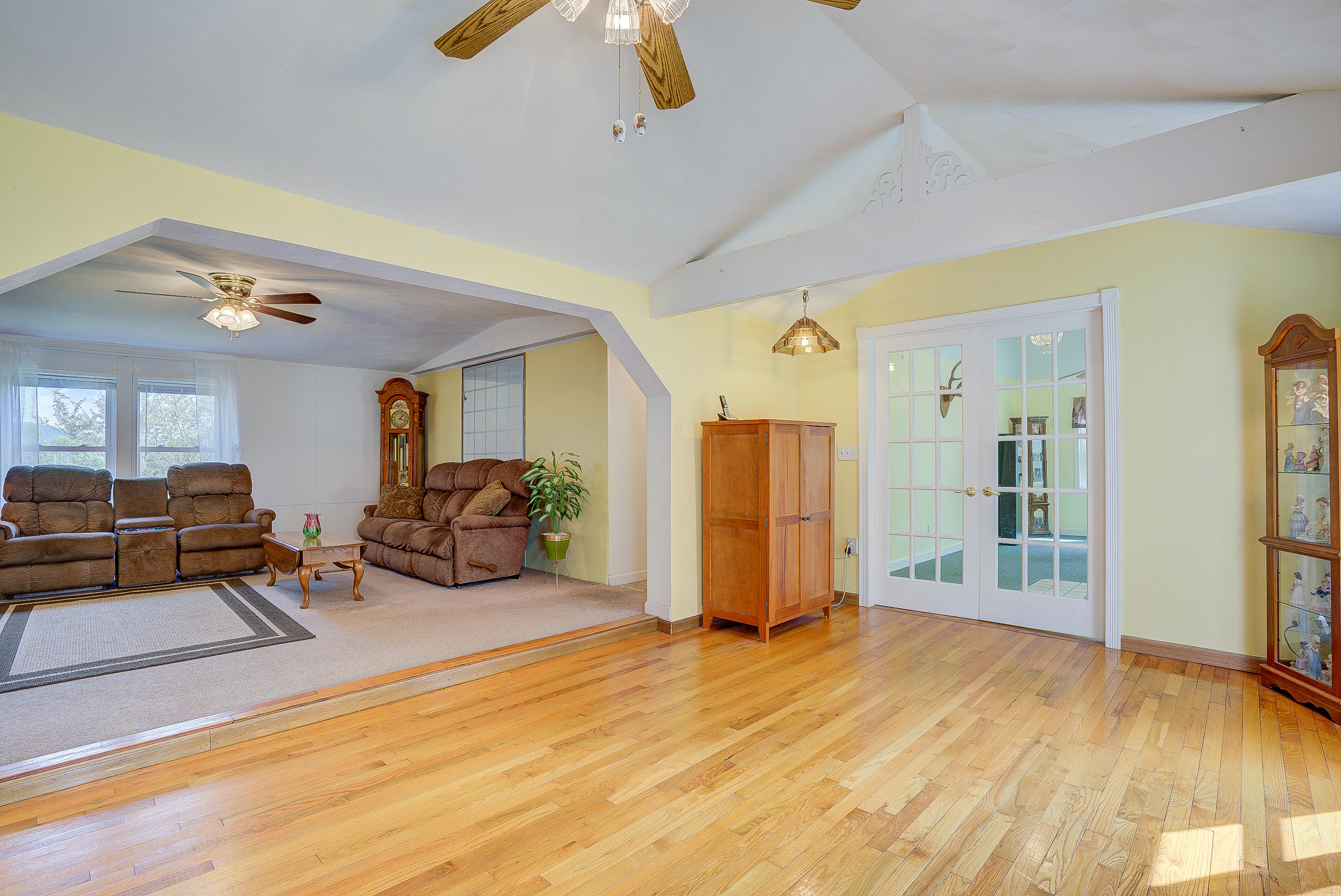 1133 Running Deer Ridge, Unit 1083 Goodview, VA 24095 - Photo 3 of 35 a view of a livingroom with furniture and an entryway