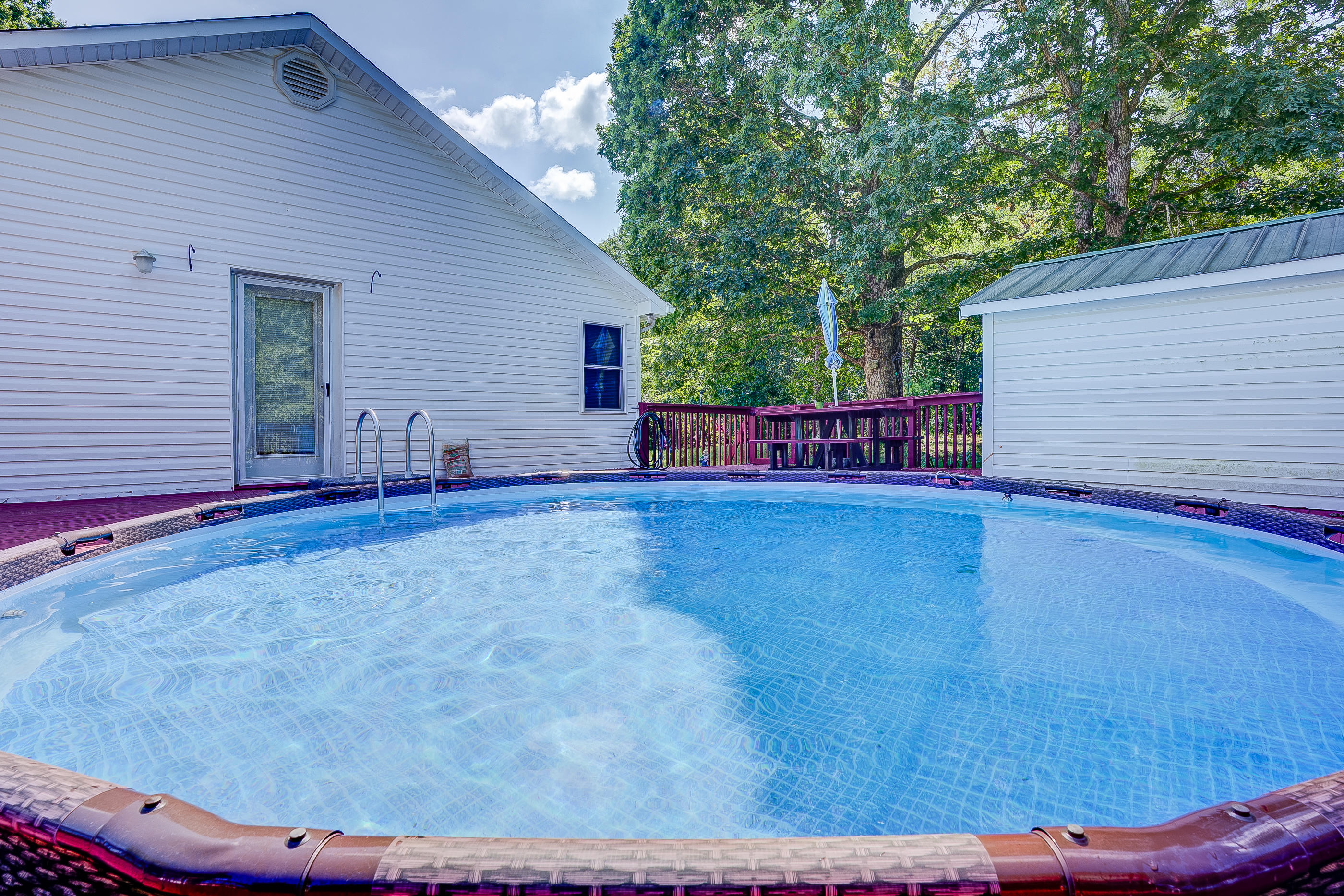 1133 Running Deer Ridge, Unit 1083 Goodview, VA 24095 - Photo 25 of 35 a view of a house with a yard