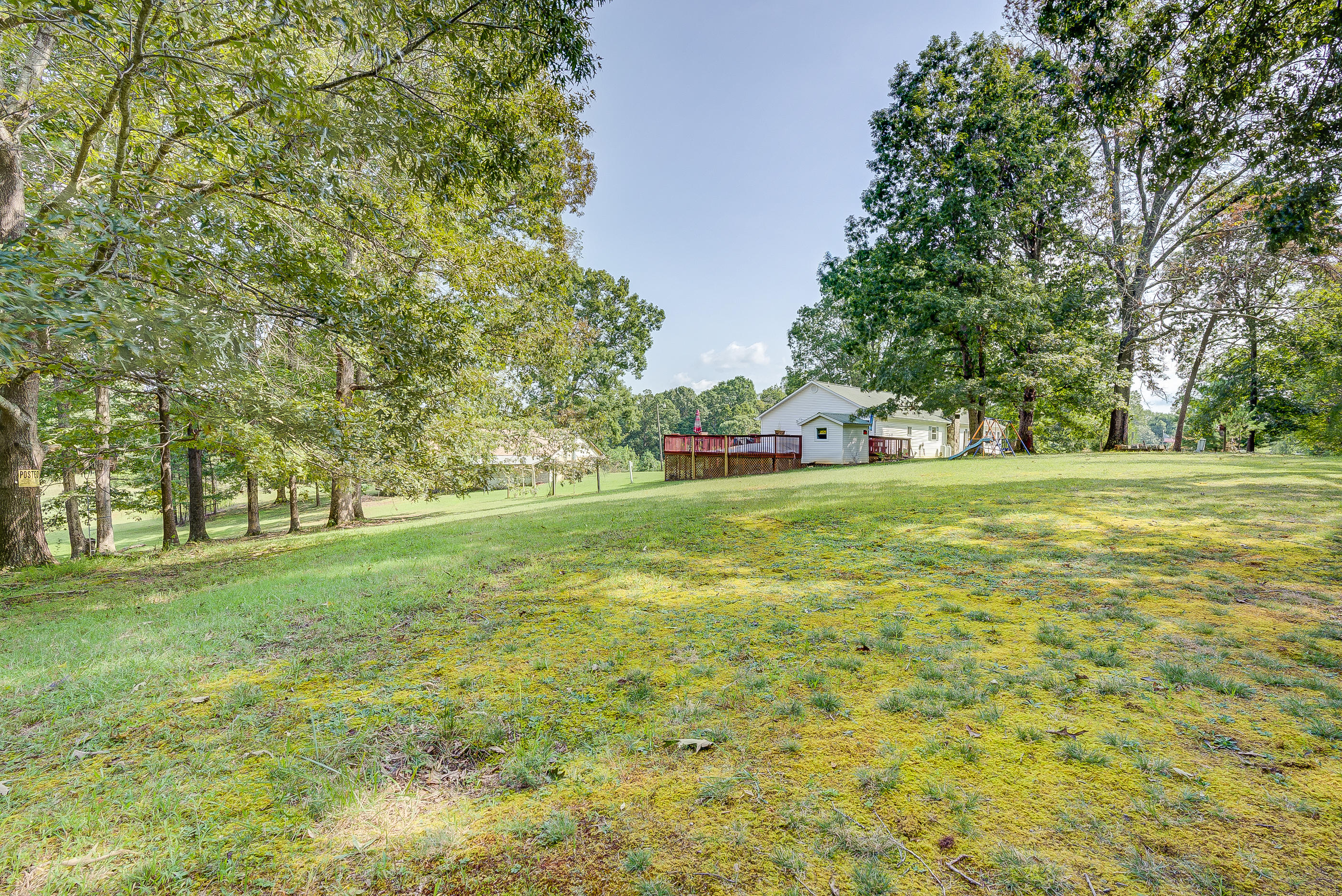 1133 Running Deer Ridge, Unit 1083 Goodview, VA 24095 - Photo 26 of 35 a view of a green field with trees in the background