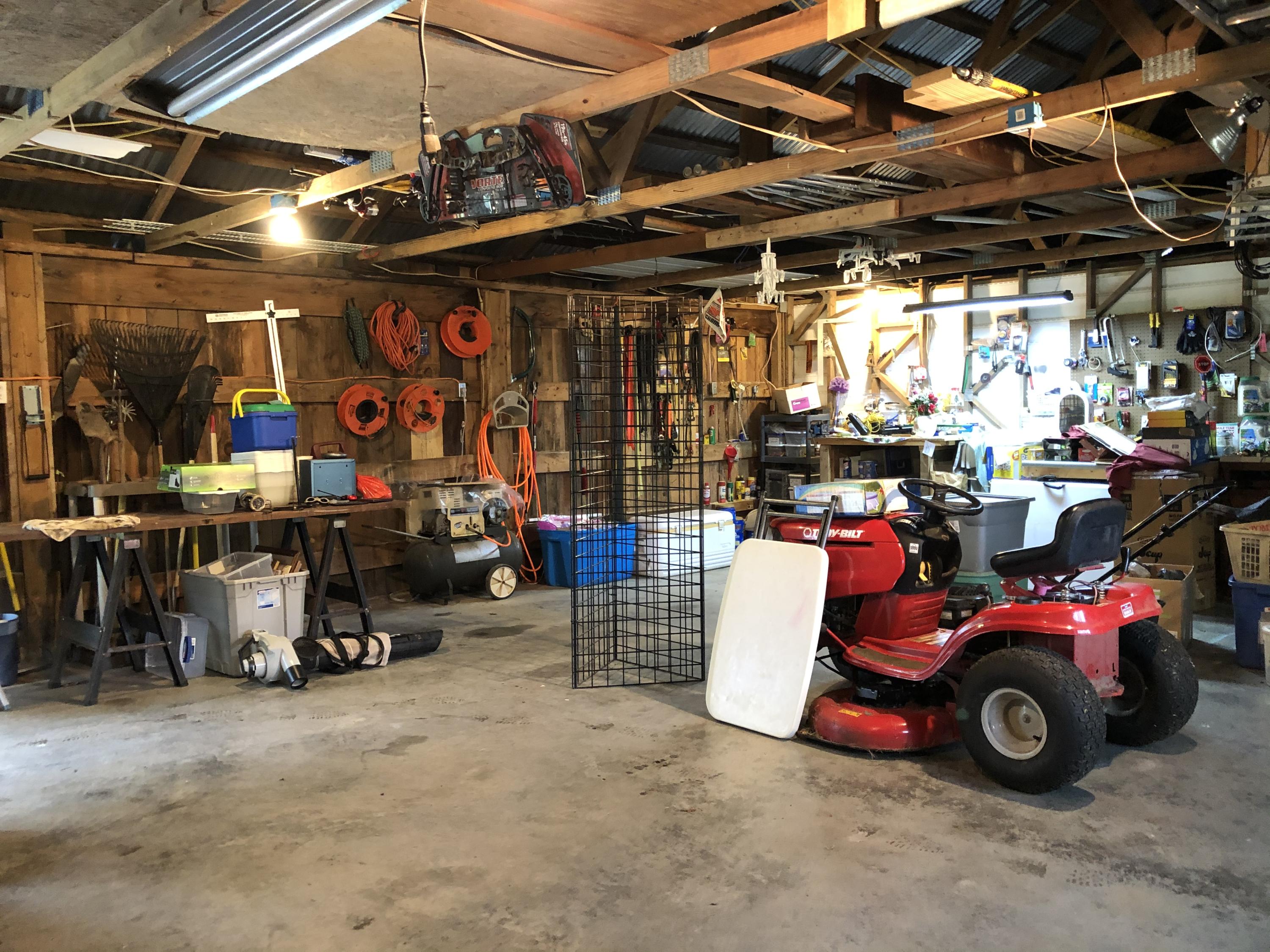 1133 Running Deer Ridge, Unit 1083 Goodview, VA 24095 - Photo 32 of 35 a view of a storage room with racks