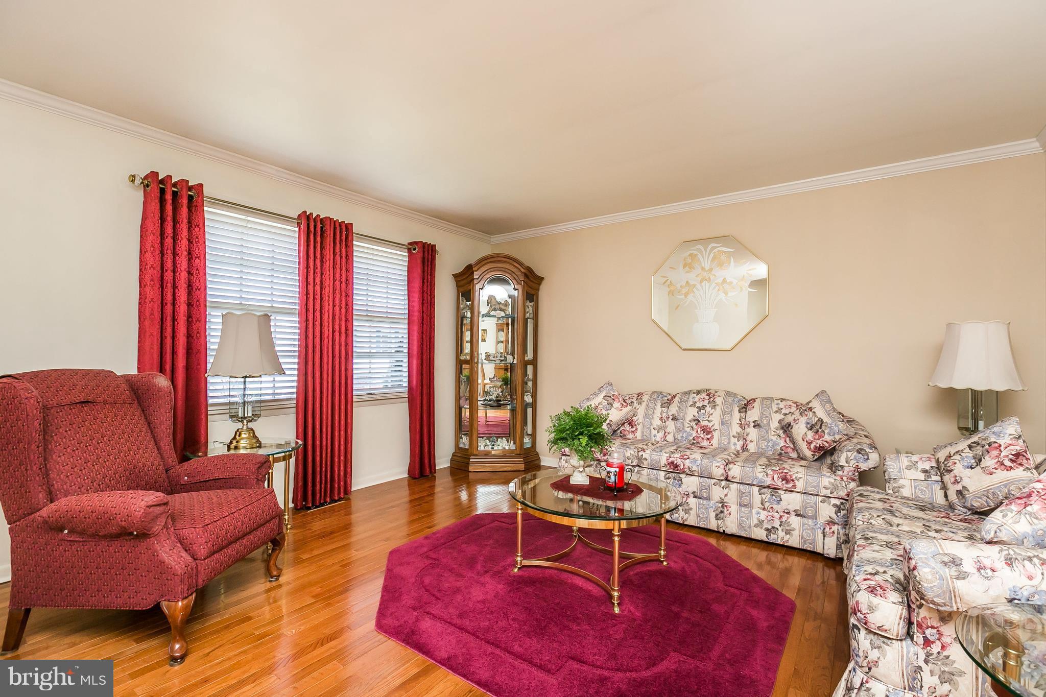 1207 Roxboro Road Baltimore, MD 21237 - Photo 5 of 30 a living room with furniture and a large window