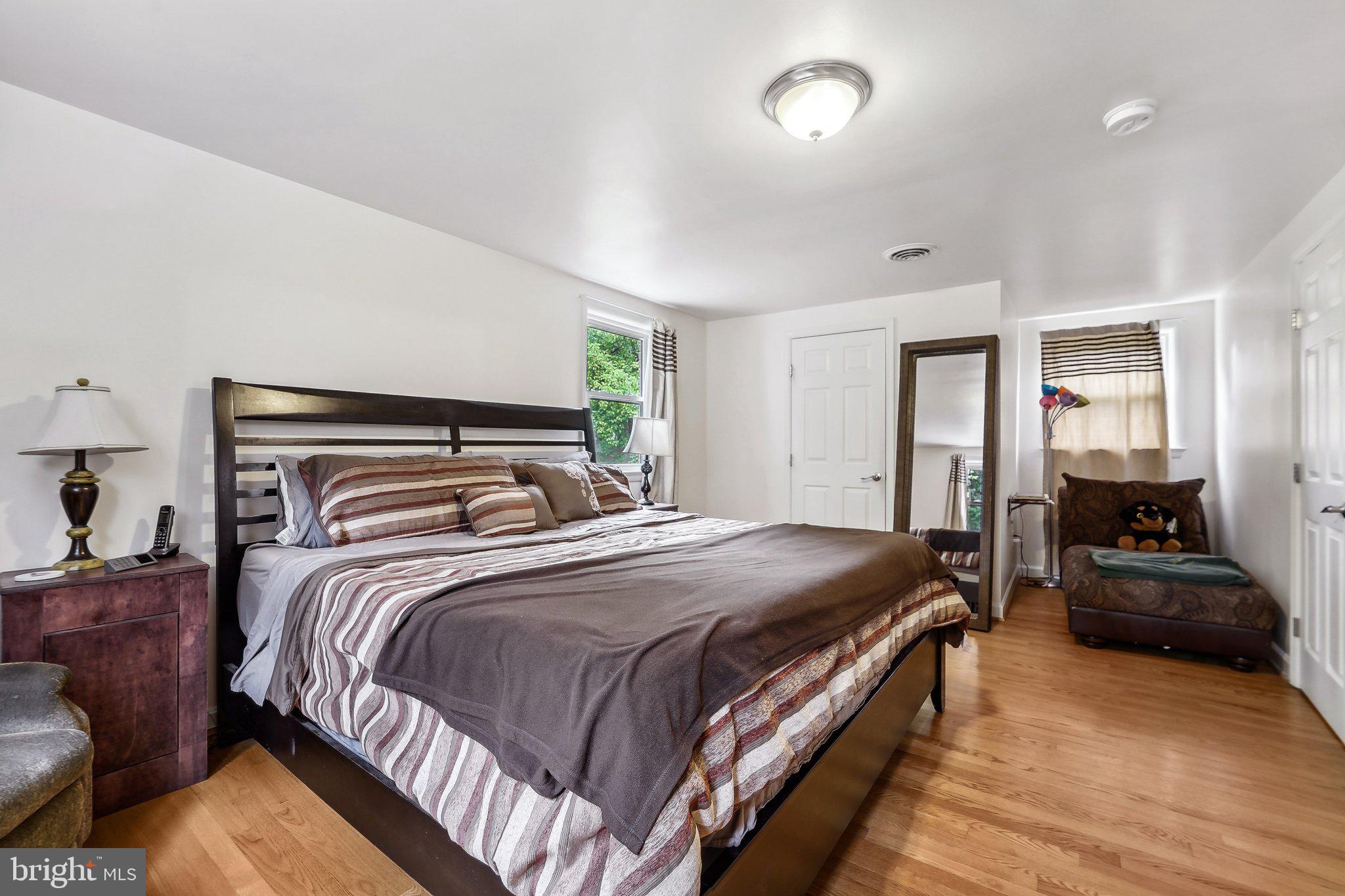 15516 Tierra Drive Silver Spring, MD 20906 - Photo 23 of 62 a bedroom with a bed and furniture