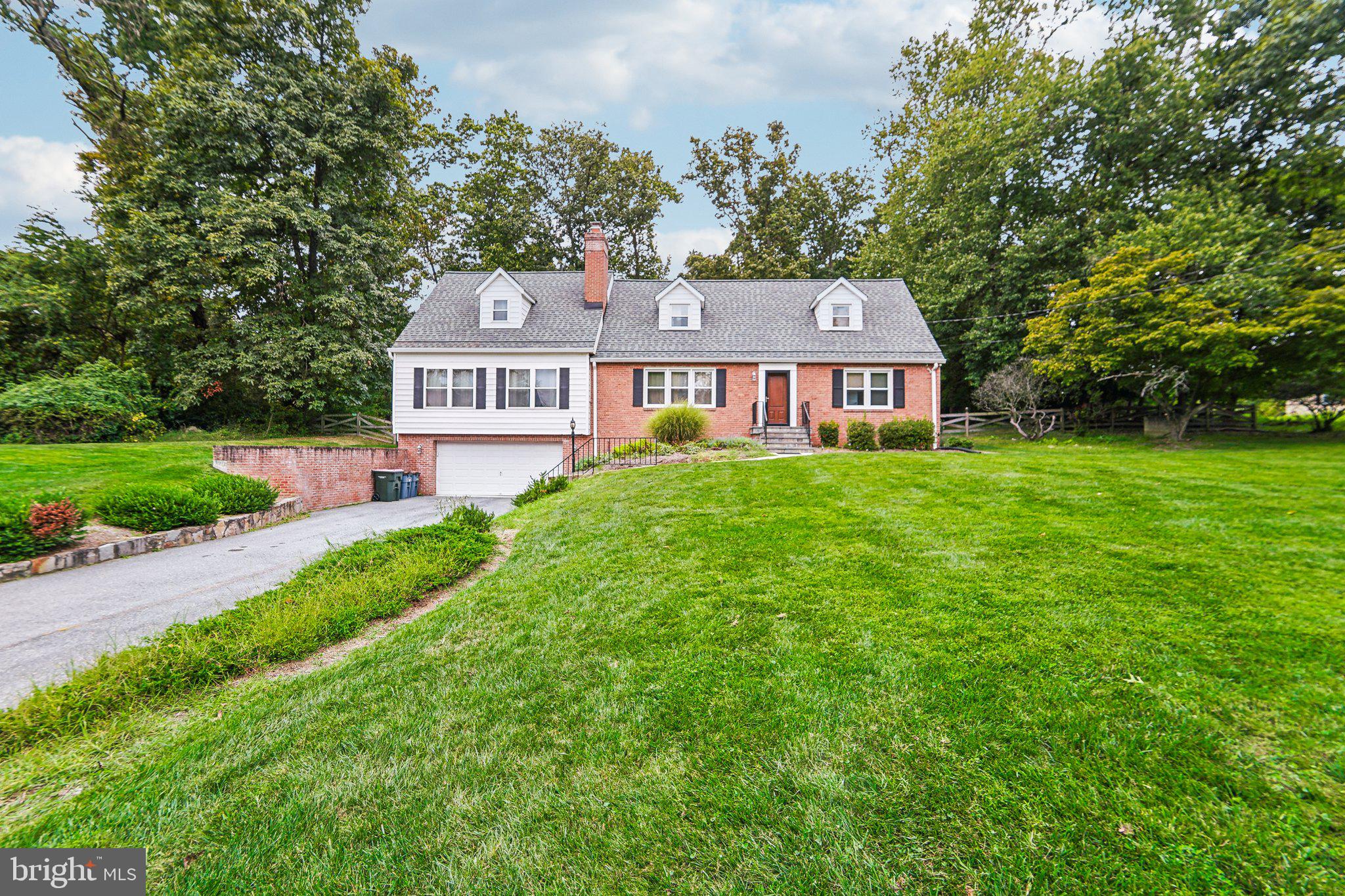 15516 Tierra Drive Silver Spring, MD 20906 - Photo 3 of 62 front view of a house with a yard