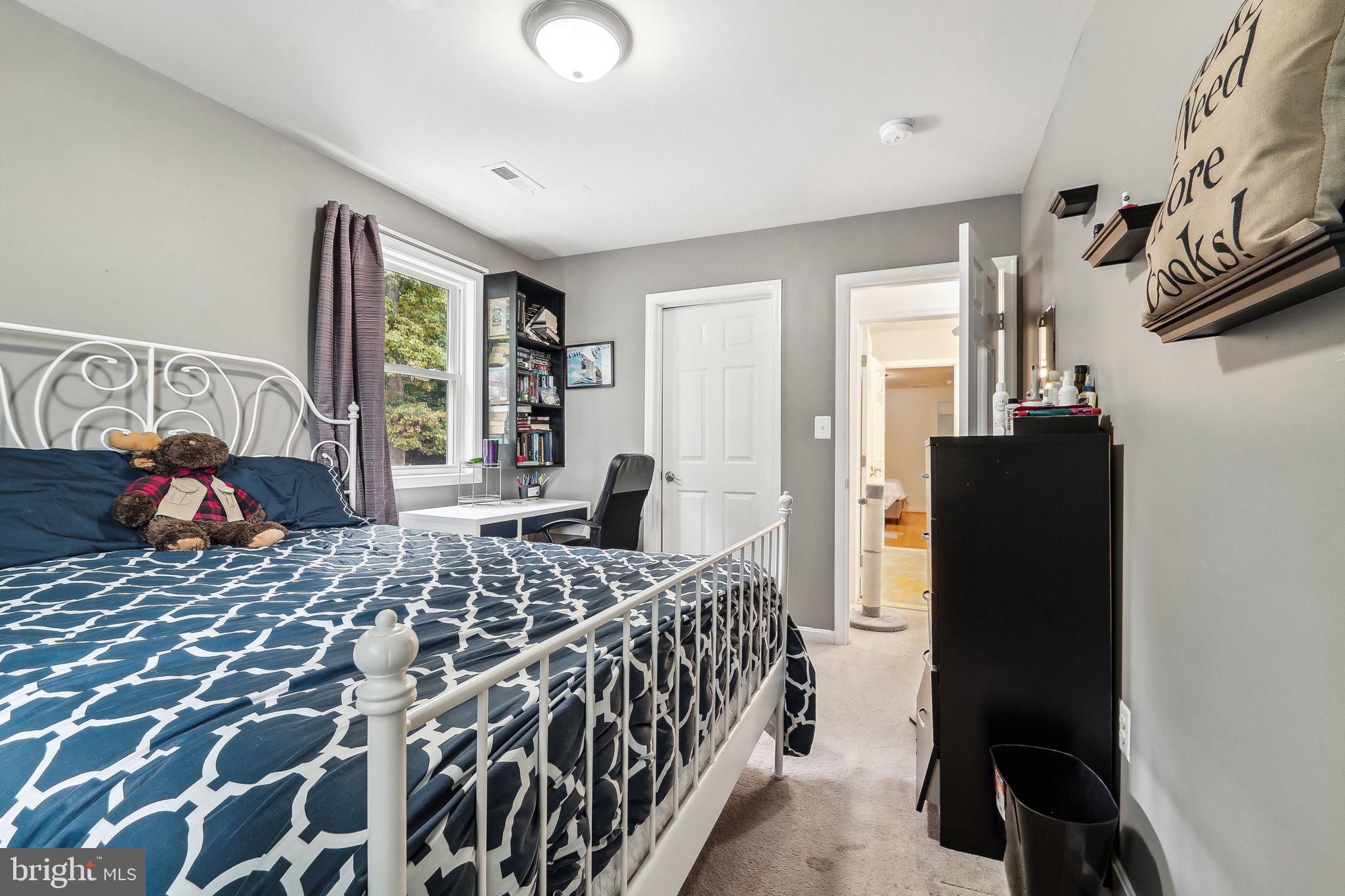 15516 Tierra Drive Silver Spring, MD 20906 - Photo 31 of 62 a bedroom with a bed and a window
