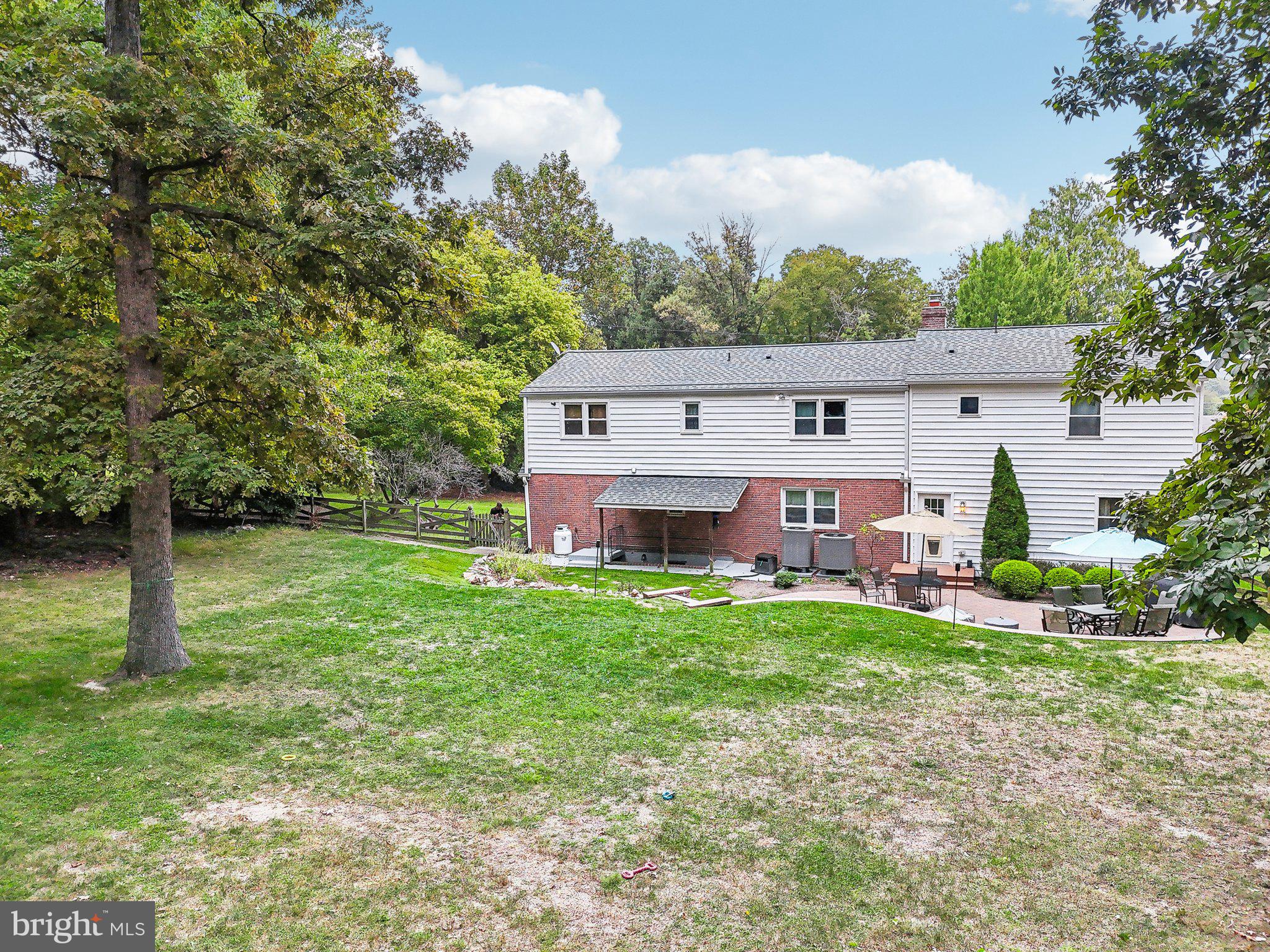 15516 Tierra Drive Silver Spring, MD 20906 - Photo 40 of 62 a view of a house with backyard and a tree