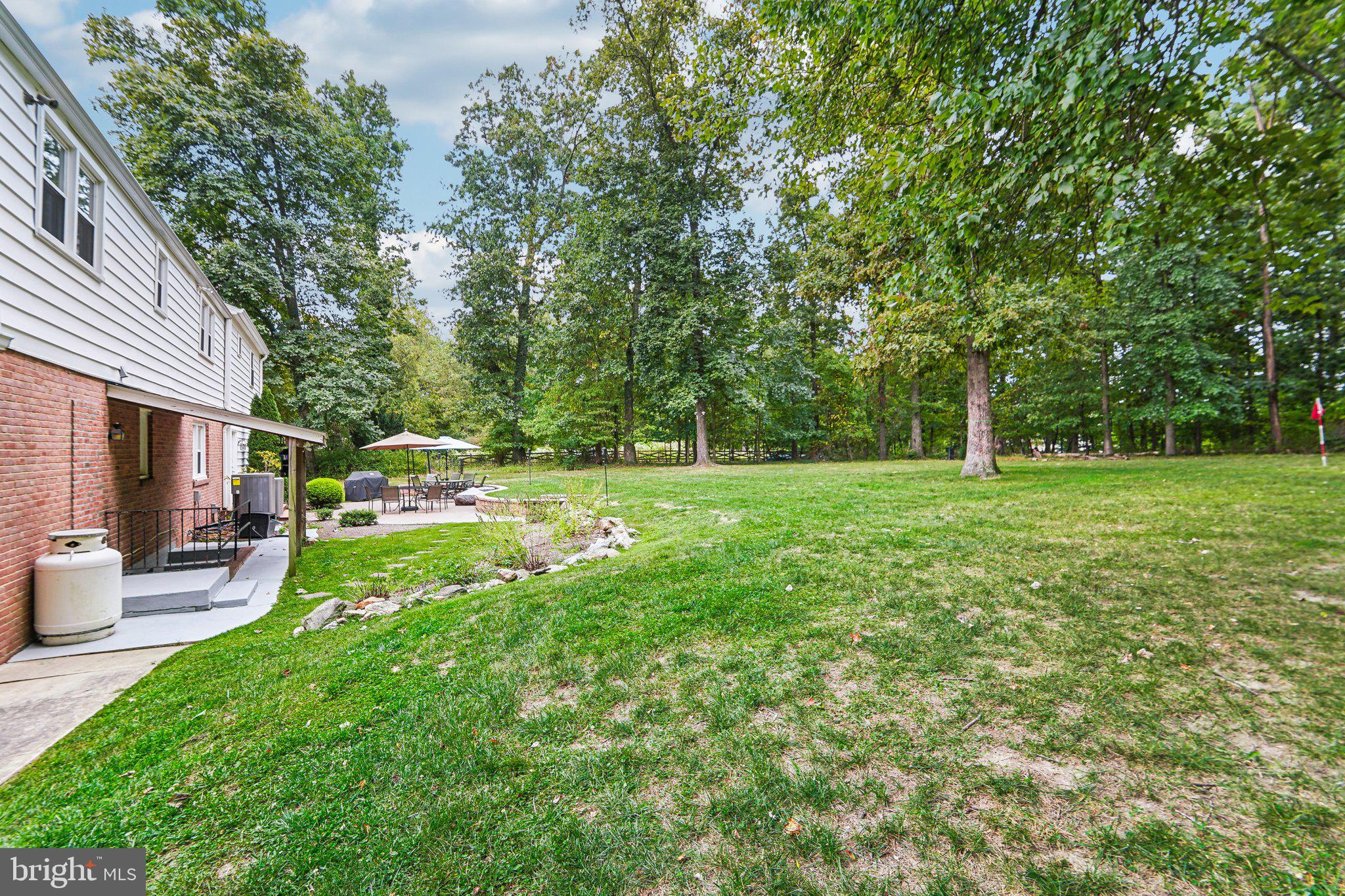 15516 Tierra Drive Silver Spring, MD 20906 - Photo 44 of 62 a view of a house with a yard porch and sitting area