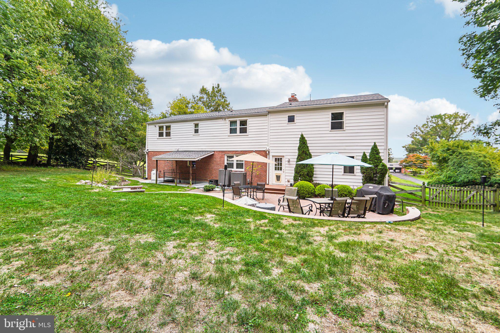 15516 Tierra Drive Silver Spring, MD 20906 - Photo 48 of 62 a view of a house with backyard porch and sitting area
