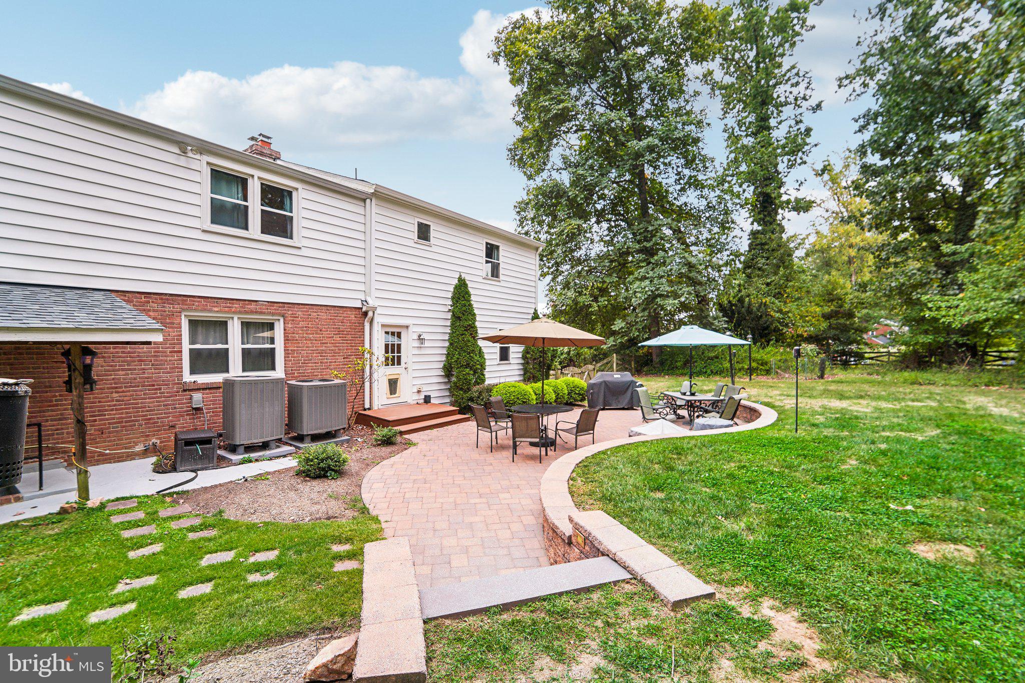 15516 Tierra Drive Silver Spring, MD 20906 - Photo 50 of 62 a view of a house with backyard sitting area and garden