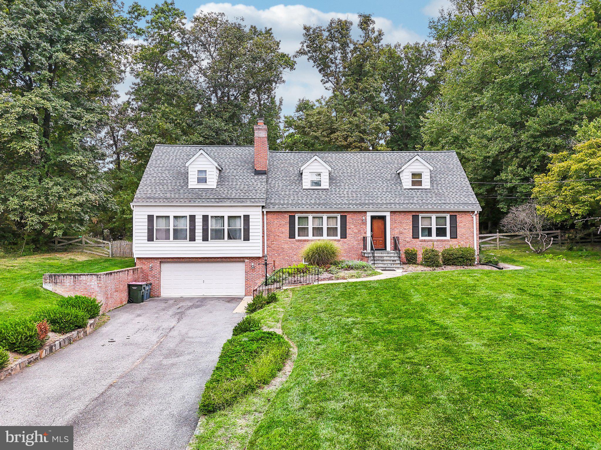 15516 Tierra Drive Silver Spring, MD 20906 - Photo 55 of 62 a aerial view of a house with a big yard and large trees