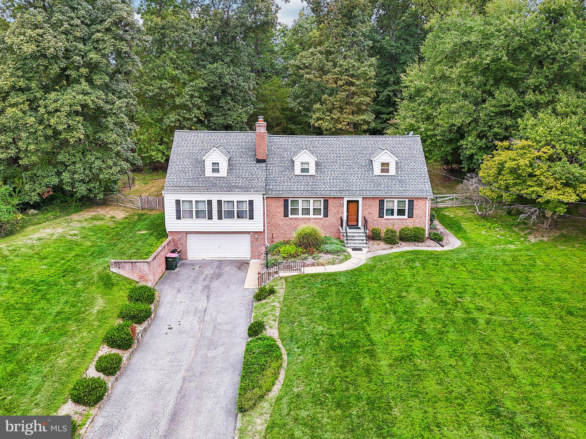 15516 Tierra Drive Silver Spring, MD 20906 - Photo 57 of 62 a view of a house with a big yard plants and large trees