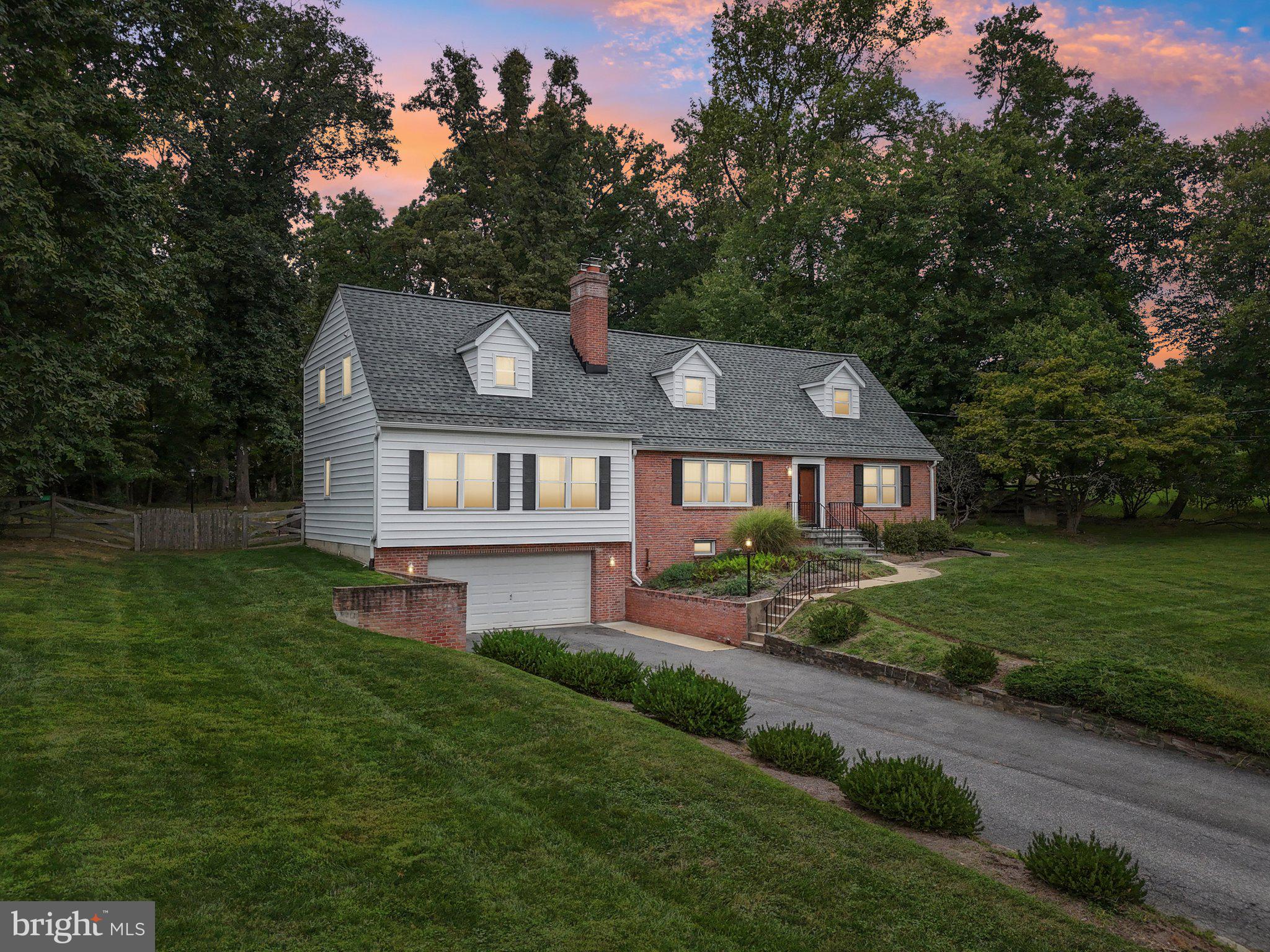 15516 Tierra Drive Silver Spring, MD 20906 - Photo 61 of 62 a front view of a house with a garden