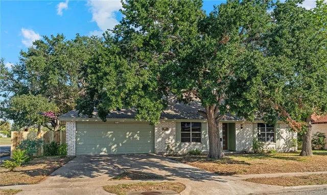 front view of a house with a street