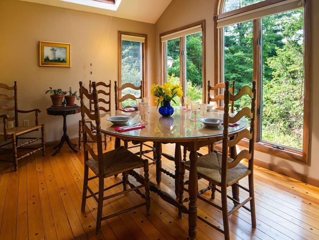 1 Long Plain Road Leverett, MA 01054 - Photo 11 of 39 a view of a dining room with furniture window and wooden floor