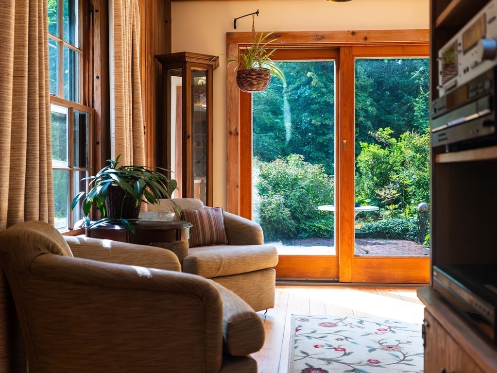 1 Long Plain Road Leverett, MA 01054 - Photo 15 of 39 a living room with furniture and a floor to ceiling window