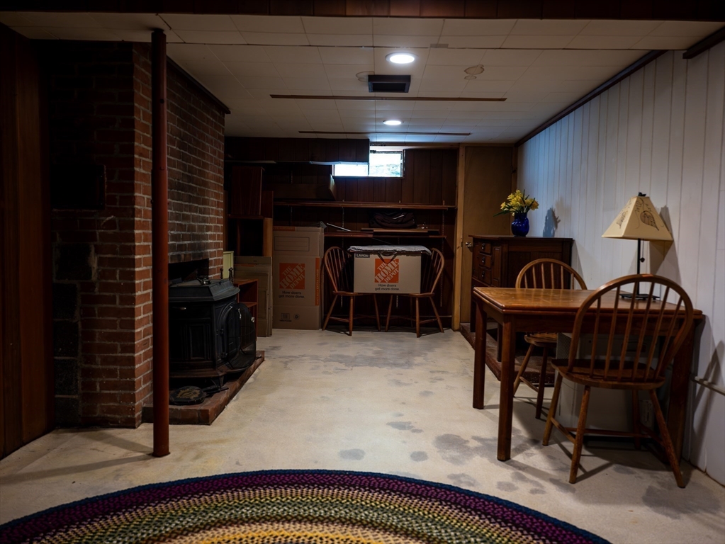 1 Long Plain Road Leverett, MA 01054 - Photo 28 of 39 a view of a livingroom with furniture and a fireplace