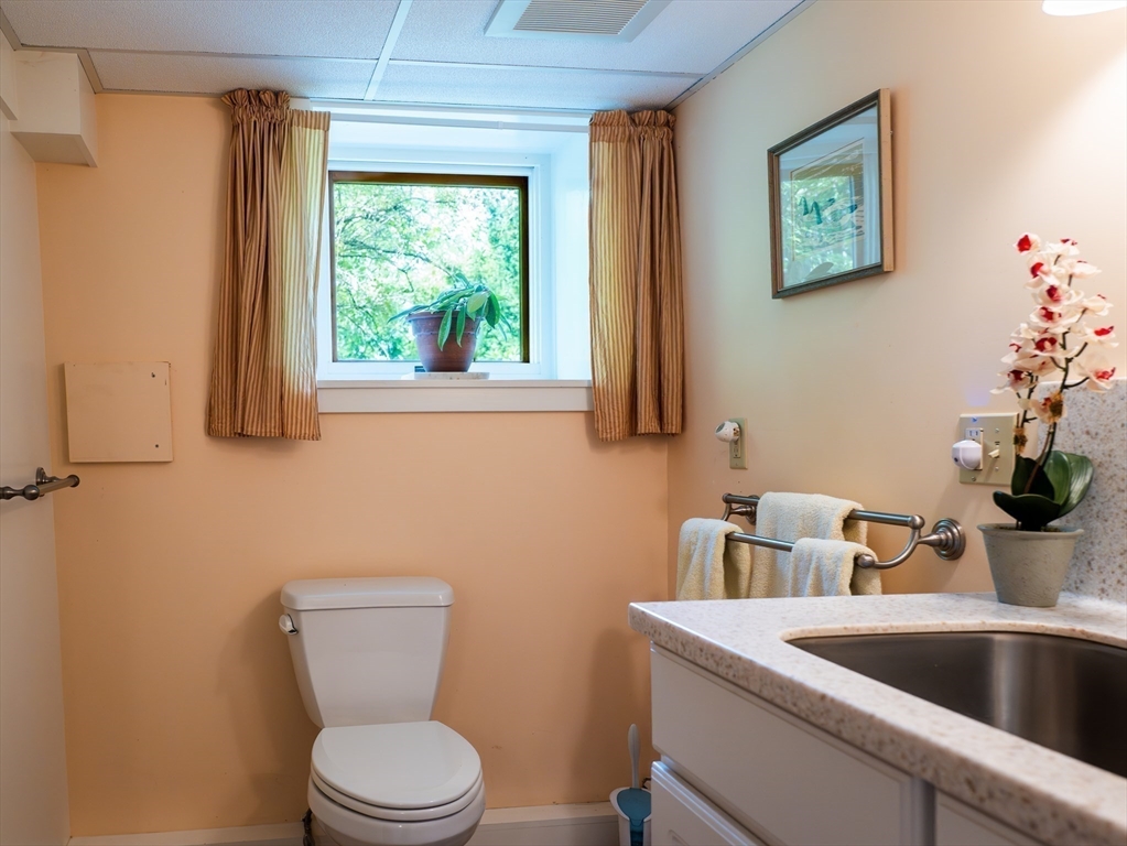 1 Long Plain Road Leverett, MA 01054 - Photo 29 of 39 a bathroom with a toilet sink and mirror