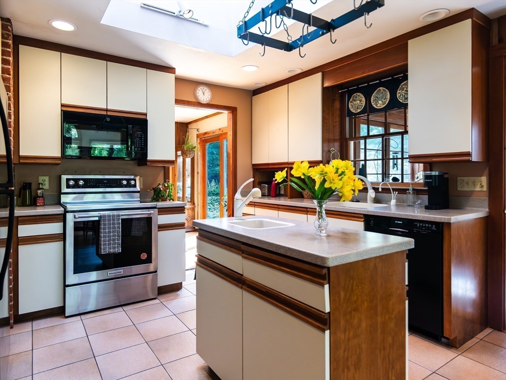 1 Long Plain Road Leverett, MA 01054 - Photo 3 of 39 a kitchen with stainless steel appliances granite countertop a stove and a sink
