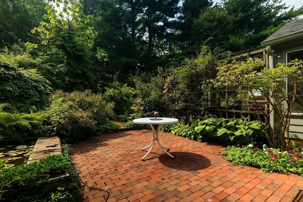 1 Long Plain Road Leverett, MA 01054 - Photo 38 of 39 a view of a backyard with plants and a patio