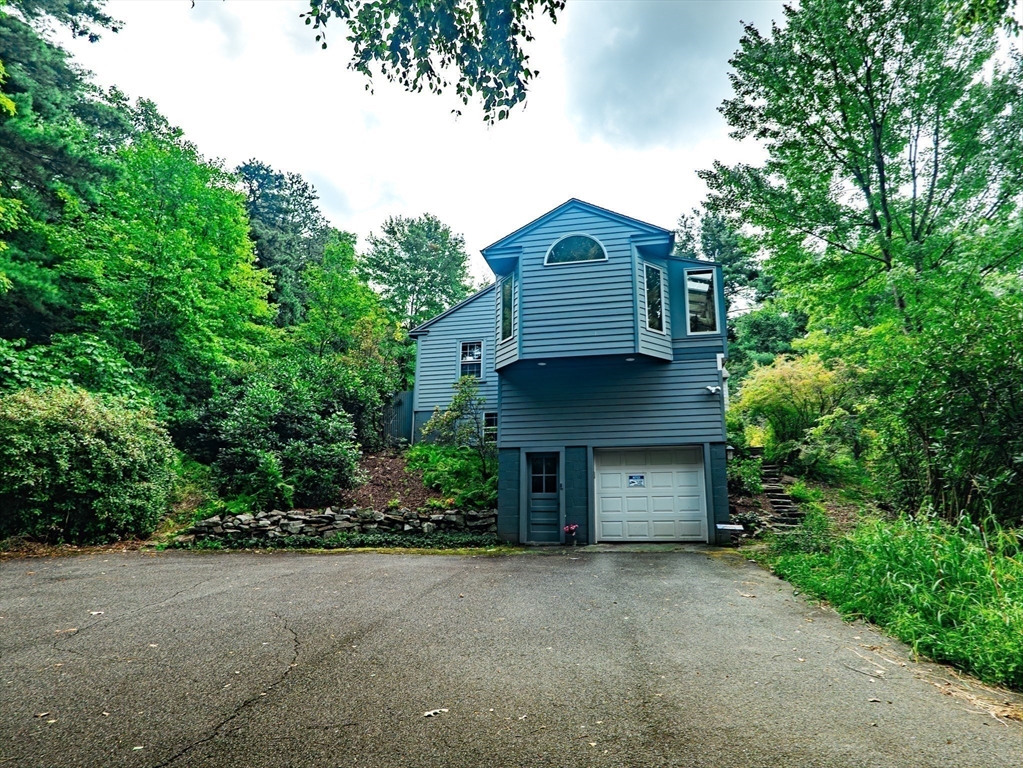 1 Long Plain Road Leverett, MA 01054 - Photo 39 of 39 a front view of a house with a garden and yard
