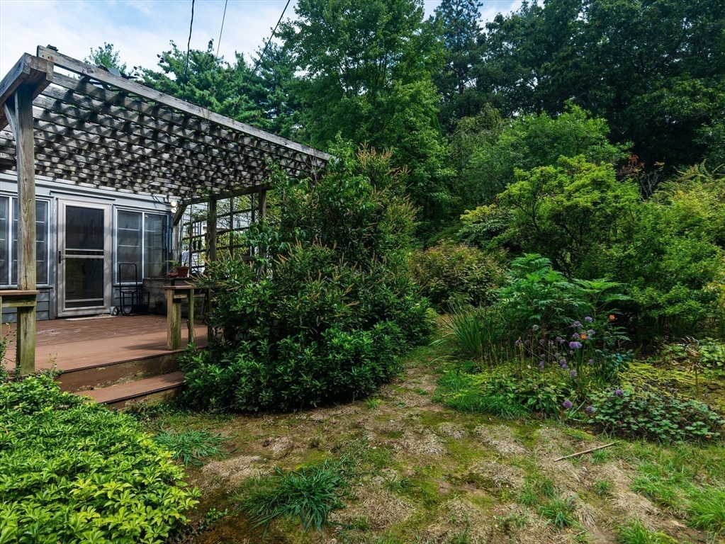 1 Long Plain Road Leverett, MA 01054 - Photo 8 of 39 a front view of a house with a yard