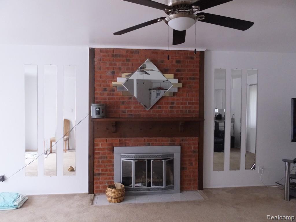 410 Peters Road Milford, MI 48381 - Photo 8 of 28 Brick fireplace surround