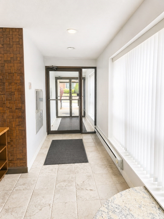 405 Langley Road, Unit 2A Newton, MA 02459 - Photo 4 of 16