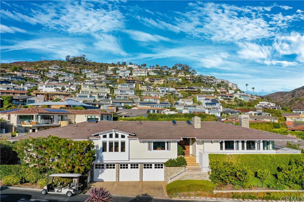 822 Emerald Bay Laguna Beach, CA 92651 - Photo 5 of 25 an aerial view of residential houses with city view