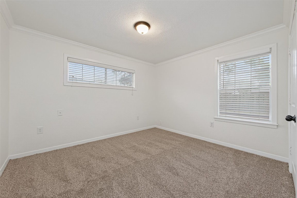7718 Morley Street Houston, TX 77061 - Photo 27 of 45 a view of an empty room with a window