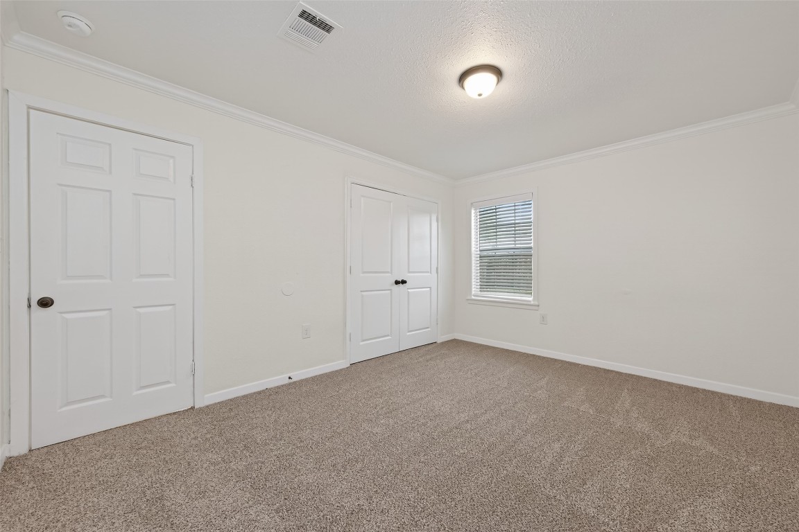 7718 Morley Street Houston, TX 77061 - Photo 29 of 45 a view of an empty room with a window