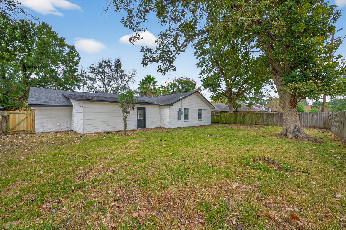 7718 Morley Street Houston, TX 77061 - Photo 43 of 45 a backyard of a house with lots of green space