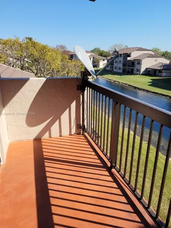 a balcony view with a garden view