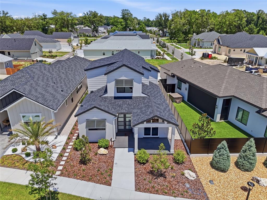 1063 Southwest 135th Way Newberry, FL 32669 - Photo 39 of 42 an aerial view of a house with a yard